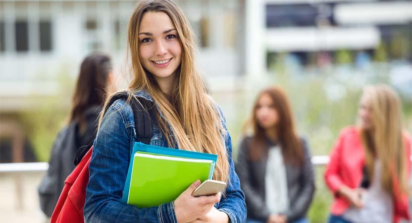 The young girl is on her way back to home after studying what is TDS Tax in Tally.