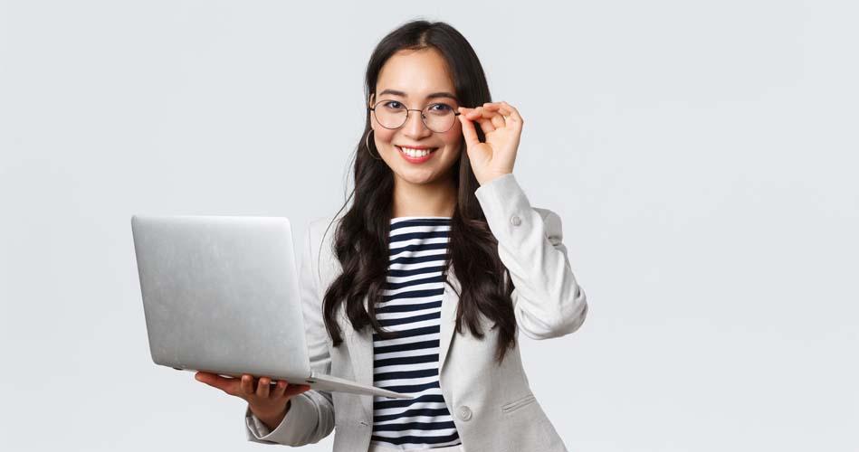 Girl working on WCF course with laptop in her hand